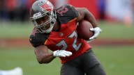 Former NFL player Doug Martin died after struggling with officers while being detained, police say