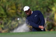 Golf-Woods will not play in his Hero World Challenge event