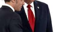 Trump’s very long handshake with Macron