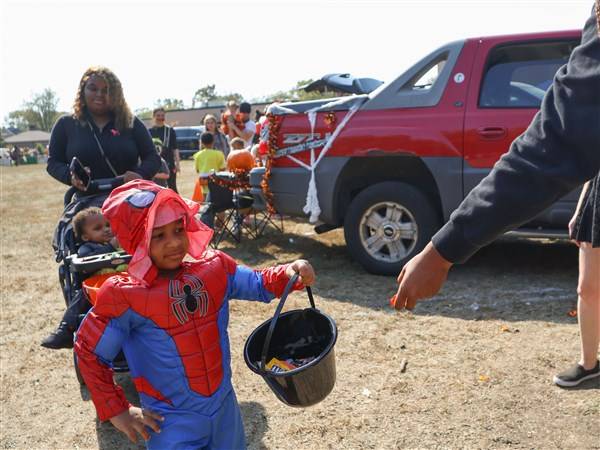 Photo Gallery: Kids line up for sweets at LCCS' Trunk or Treat
