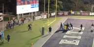 Reitz High School quarterback taken by ambulance from field