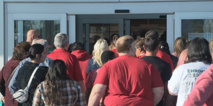 Grand Island Target holds ribbon