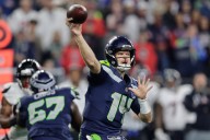 Smith-Njigba, defense show out again for Seahawks in 27