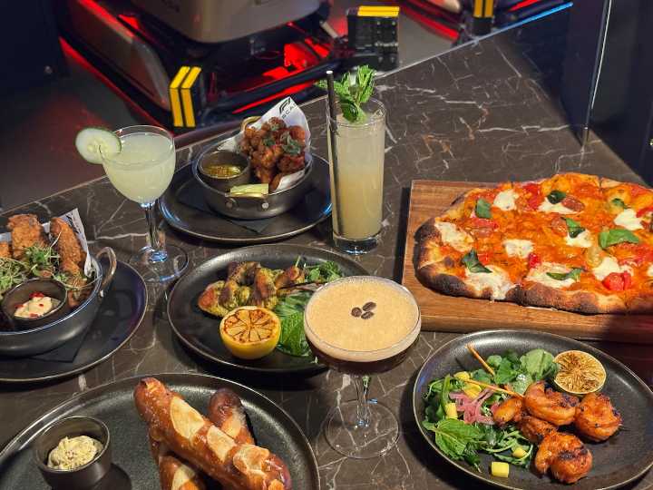 Race to F1 Arcade in Seaport for $7 drinks, $8 appetizers on afternoons
