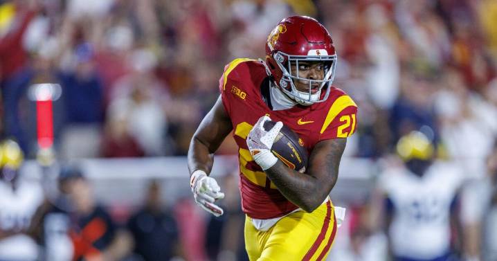 Depleted USC fined by Big Ten for playing running back listed 'out' on injury report