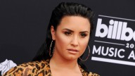 Demi Lovato Debuts Drastic Face Transformation At Paris Fashion Week & She Looks Unrecognizable