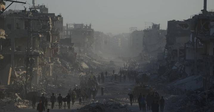 Palestinians return to ruins as aid groups push to scale up deliveries and US troops land in Israel