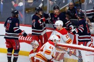 The Winnipeg Jets beat the Calgary Flames in NHL action