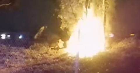 Video shows CHP officers pulling unresponsive driver from burning car in South Los Angeles