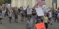 Thousands participate in ‘No Kings’ protests across Louisville area