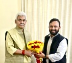 LG Manoj Sinha meets BJP spokesperson Ankur Sharma and former sarpanch Vandana Kumari in Jammu