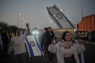 The Latest: Israel prepares to welcome home hostages from Gaza