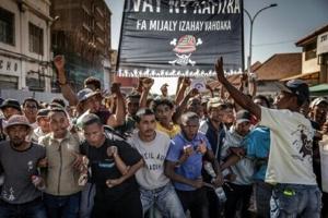 Madagascar president hangs on to power as thousands protest