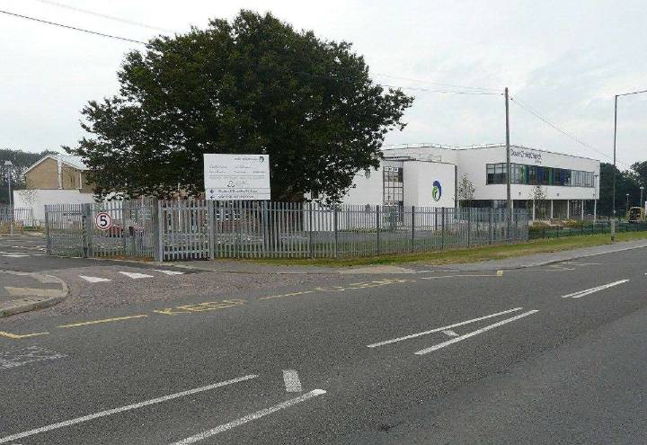 Tradesman holding saw outside Dover Christ Church Academy in Melbourne Avenue, Dover, sparked school lockdown