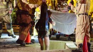 Woman clinging to teddy bear rescued from drainage hole in Los Angeles