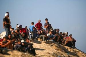 ‘Full of sorrow’: Gazans trek home as truce begins