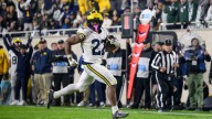 Ground game is decisive in Michigan's victory in rivalry game