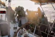 Israeli navy intercepts some flotilla boats but others are nearing the coast of Gaza, activists say