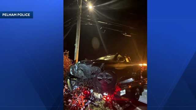 2 arrested after truck crashes into rock wall in Pelham
