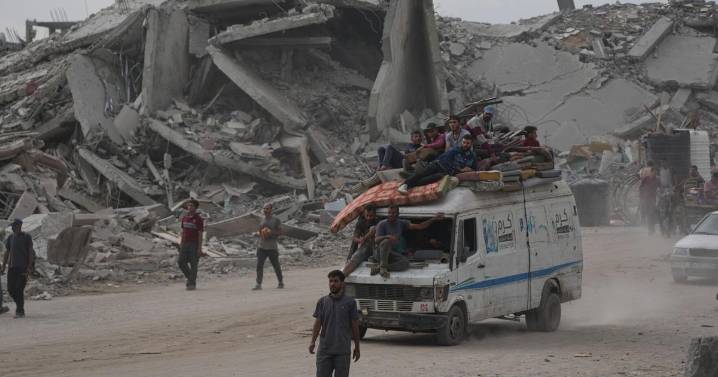 The Latest: Palestinians journey back home as aid convoys start to enter Gaza