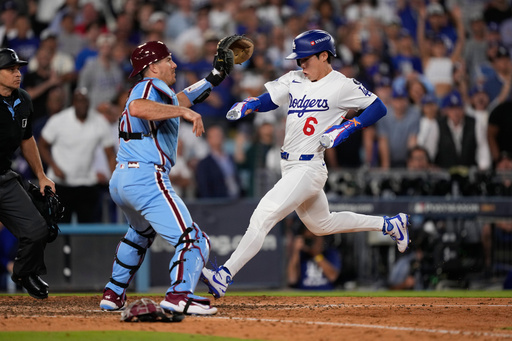 Dodgers advance to NLCS after Kerkering's 11th-inning error beats Phillies