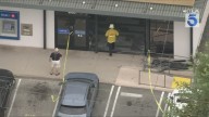 Car drives into front of Northridge bank