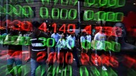 Australian shares slip, gold hits fresh record