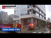 Chicago firefighters  respond to fire at high-rise in South Loop, video shows