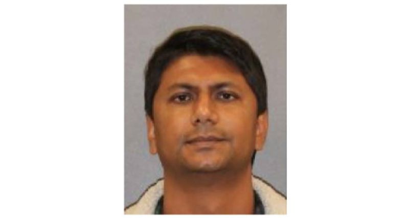 Indian-American govt employee arrested for holding ‘second, full