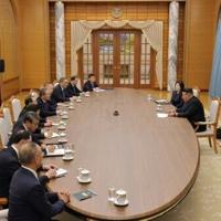 North Korea's Kim hails 'cooperative' ties with China