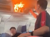 Susto entre los pasajeros de un avión de Air China por una batería portátil que se incendió en un portaequipajes