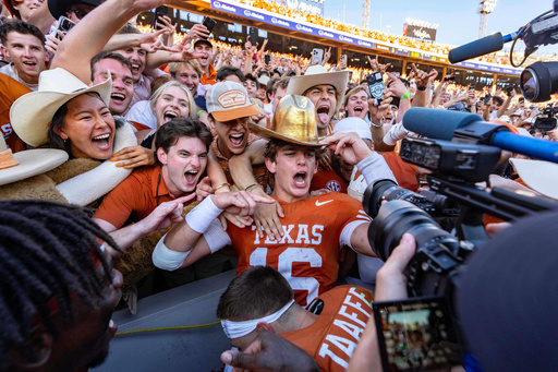 The Latest: Big shakeups in store for the college football top 10 of the AP Top 25 coming soon