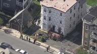 Worker injured in fall from triple-decker roof, contractor says