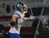 H.S. Football: Coll shines as Springfield stays perfect, dedicates win to Herzig