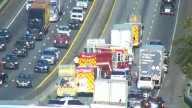 Crash involving semi-truck and septic truck shuts down lanes on I