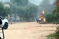 Ⱥsәsinan a elemento de la GN en Culiacán