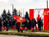 Hundreds protest job losses at Cami plant