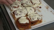 Aussie cinnamon scroll baker in battle of the buns with US chain