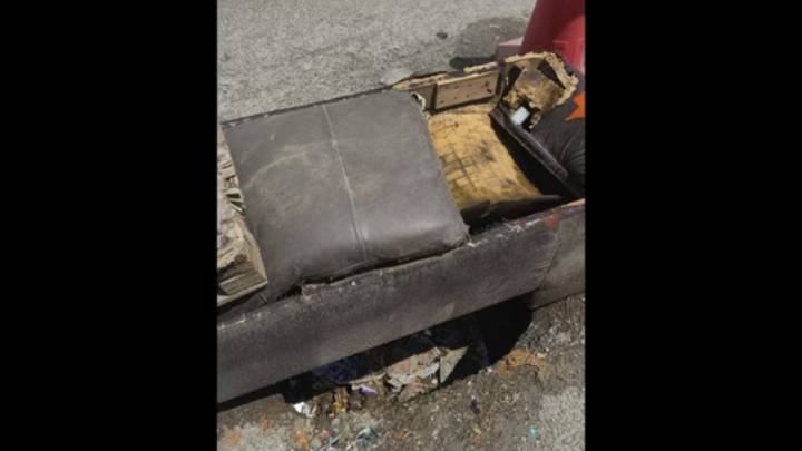A couch, a pothole, and broken promises: Bengaluru’s roads in crisis