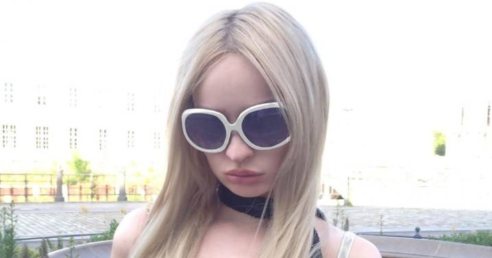 Kim Petras Turns Head in Pink Lingerie & Fishnets
