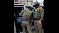 WGN News employee detained by federal agents on Chicago's North Side, videos show
