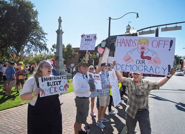 Latest 'No Kings' draws hundreds to peaceful protest on the square