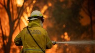 Teen volunteer firefighter charged with lighting bushfires in Sydney's west that he then helped put out