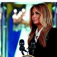 Author sues first lady, alleging threat of suit