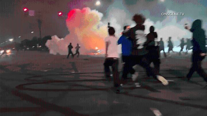 Car bursts into flames during stunt at Southern California street takeover
