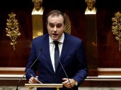 French PM survives no-confidence votes after making pension concession