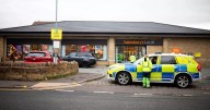 Driver, 56, arrested after car hits man and crashes into Sainsbury's