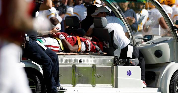 Oklahoma WR Keontez Lewis leaves game after headfirst collision with brick barrier