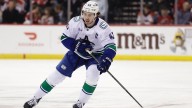 Hughes, Sasson lead Canucks to thumping of Flames in pre