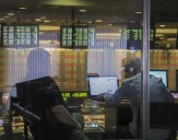 Acciones y bonos argentinos operaron en alza este miércoles, tras la intervención de EE.UU. en la compra de pesos